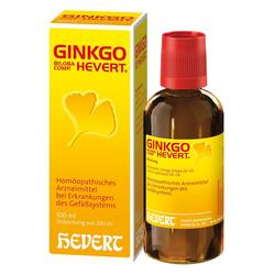 Braune Glasflasche und gelbe Schachtel mit homöopathischem Arzneimittel.